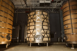Three large barrels in a room